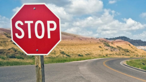 Stop sign on country road